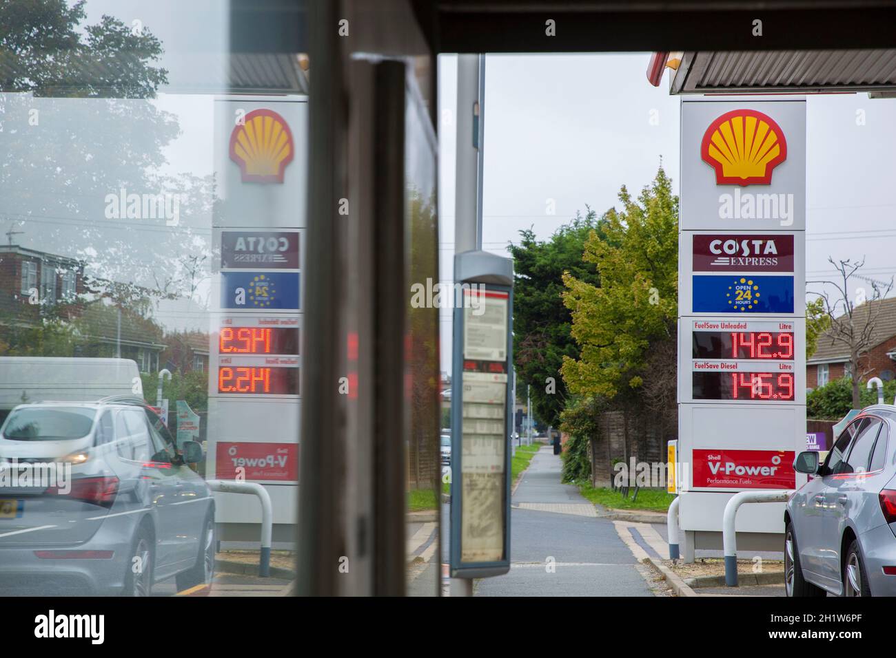 Petrol prices over `£1.4 per litre are displayed at petrol stations in